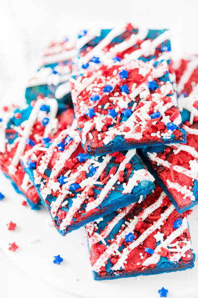 Red white and blue dessert bar with with icing and sprinkles