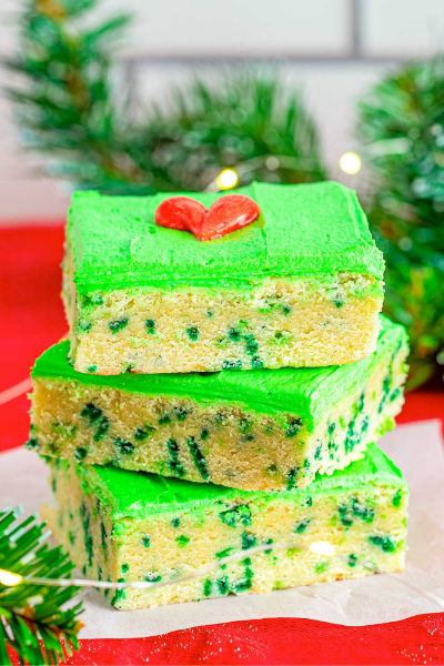 3 Green Grinch Sugar Cookie Bars stacked on top of each other