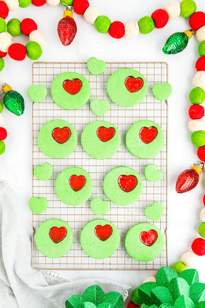 Baking wire rack with green cookies with red hearts