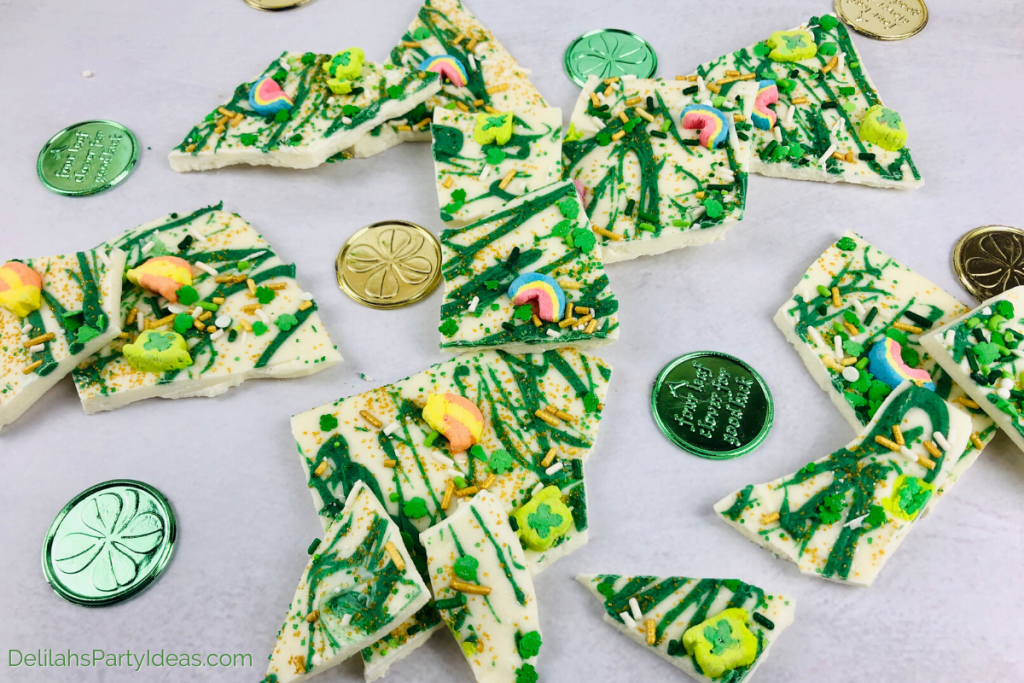 St Patricks Day homemade bark with green and gold coin chocolates as decorations on kitchen bench