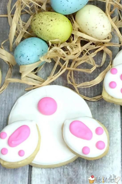 Easter Bunny Butt Cookie with chocolate speckled eggs next to the cookie