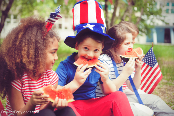 kids eating watermelon at 4th of July Party