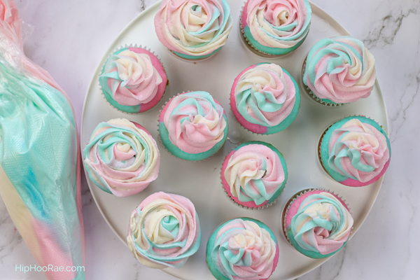 Pretty Cotton candy cupcakes on plate