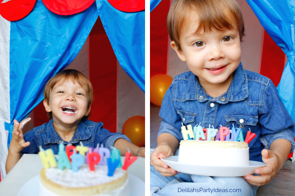 toddler with his birthday cake