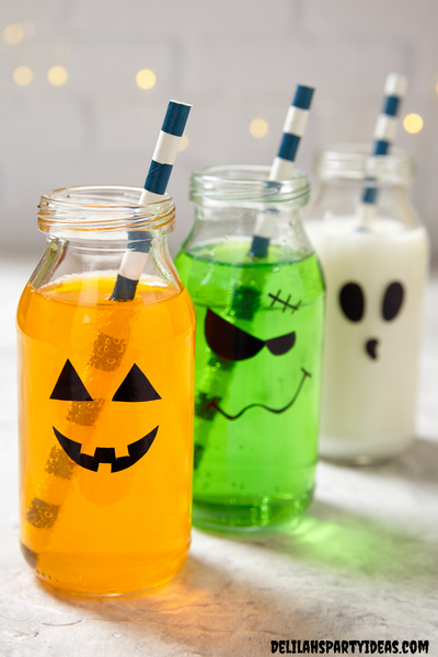 Halloween glasses with vinyl decals on them to look spooky