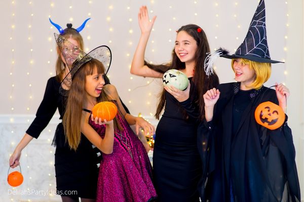 Teens dressed in Halloween Costumes