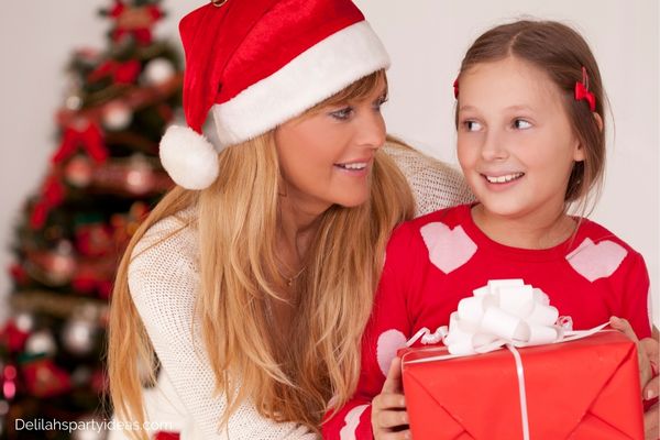 Mother wearing Santa Hat with her daughter