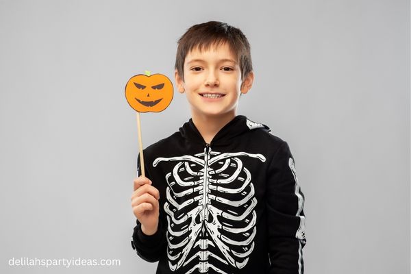 Boy dressed in skeleton costume for halloween