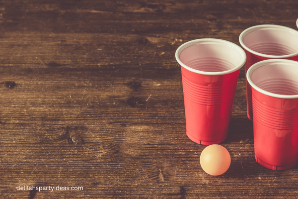 Ping pong ball and red cups