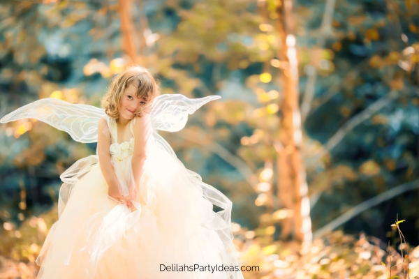little girl wearing a fairy costume