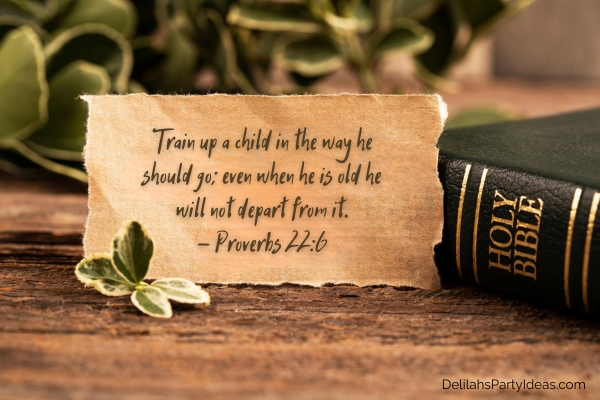 Bible quote on torn paper beside bible