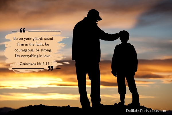 Silhouette of father and son at sunset with bible quote overlay