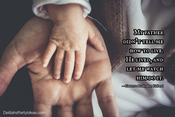 child's hand on top of father's hand, with quote overlay
