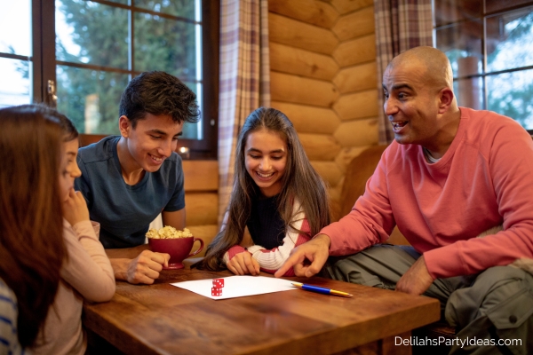 family playing dice game