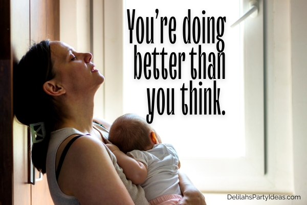 Tired mother holding baby, with quote overlay
