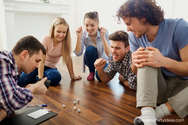 Group of friends playing dice game