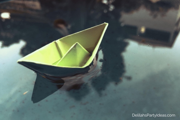 paper boat floating on water