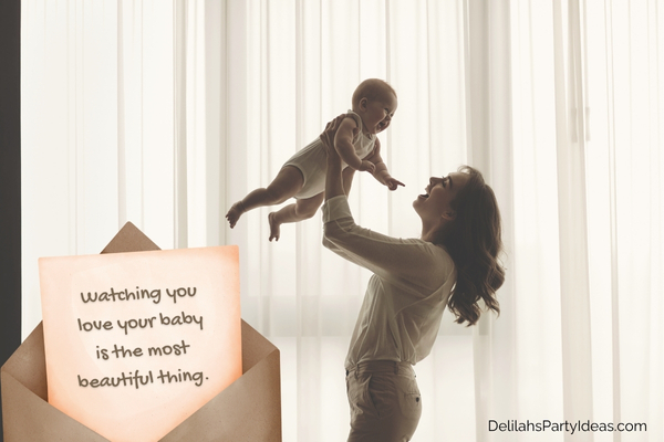 Mother holding her baby up, with quote overlay