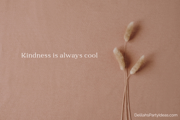 Bunny tail grass on salmon color background with quote overlay