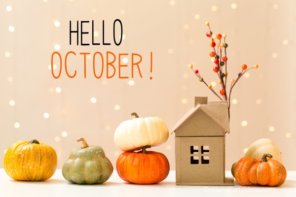 Hello October message with mini pumpkins and mini house