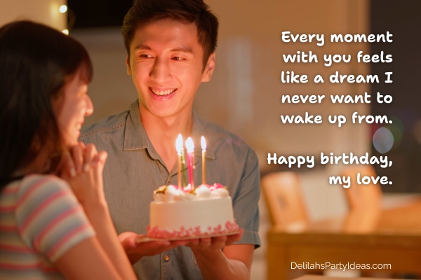 Man holding birthday cake for wife, with quote overlay