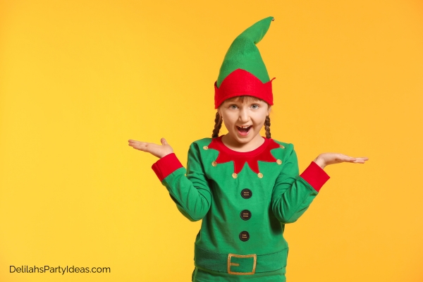 Girl wearing a Christmas elf costume