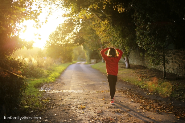 Lady taking a morning walk in fall season
