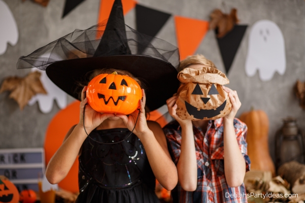 kids in halloween costumes and masks