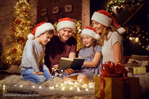 family reading a book on Christmas