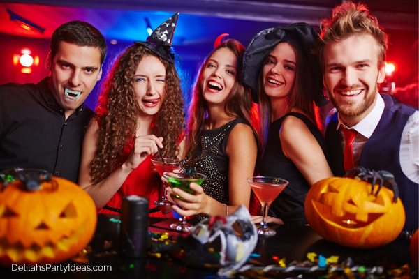 Friends wearing Halloween costumes in a party