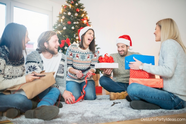 group of friends exchanging gifts on Christmas