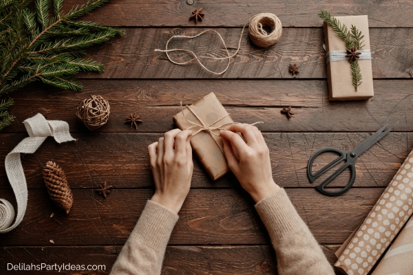 woman's hands wrapping her homemade Christmas gift