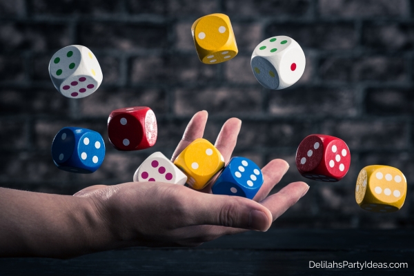 hand throwing ten dice