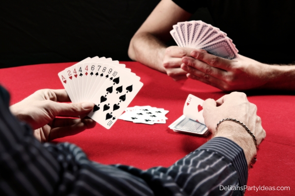 2 people playing rummy card game