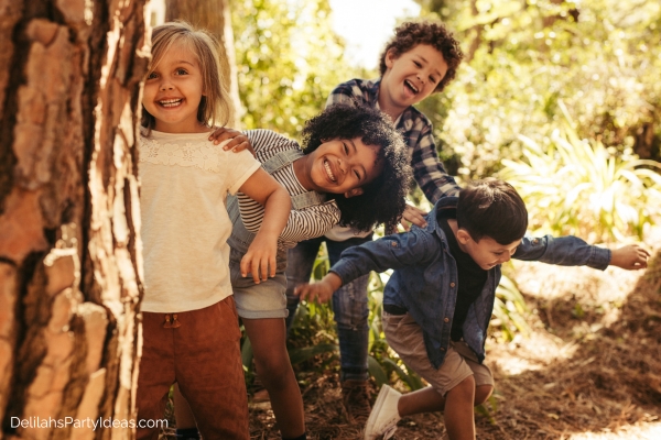 group of kids playing hide and seek outdoors