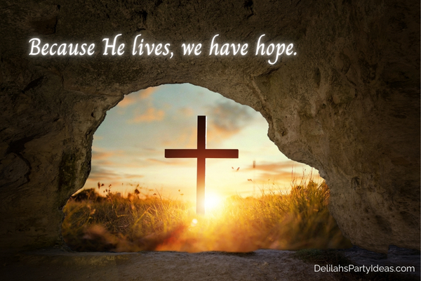 Cross in tomb at sunrise, with quote overlay