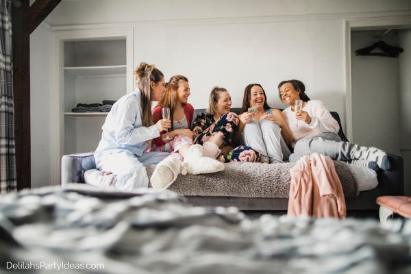 group of female friends having a sleepover party