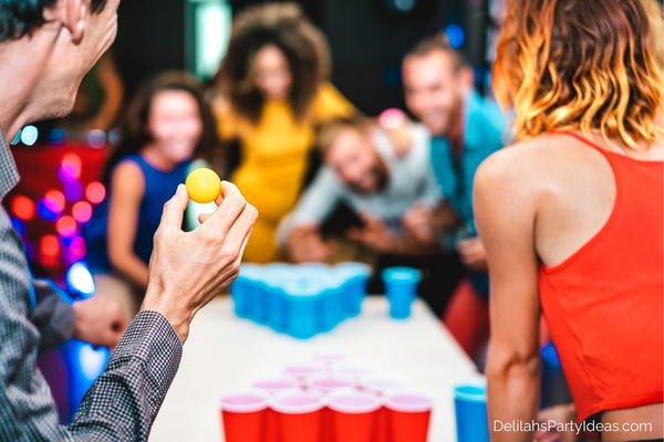 group of friends playing ping pong madness