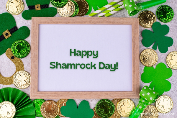 St. Patricks Day background of shamrocks, coins, leprechaun, wooden frame in the middle with quote overlay