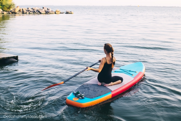 woman paddle boarding