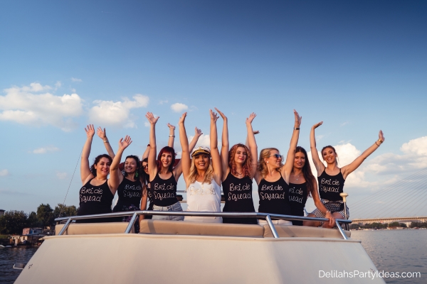 bride with her friends wearing matching shirts for bachelorette party