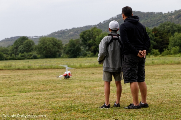 father and son playing outdoors