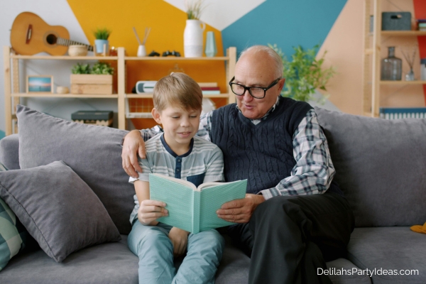 grandfather reading to this granddson
