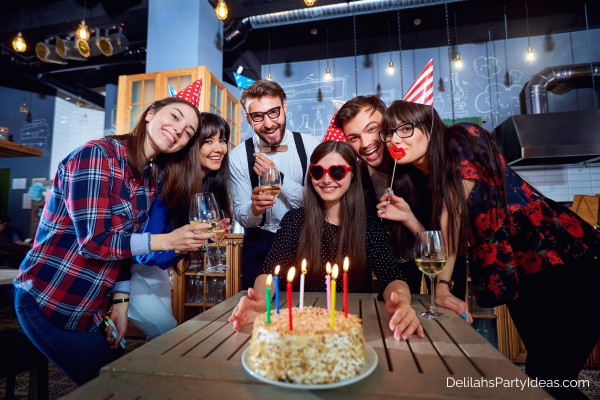 teenaged girl celebrating her birthday party with friends