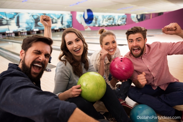 friends having fun bowling