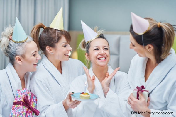 woman celebrating birthday with friends at a spa