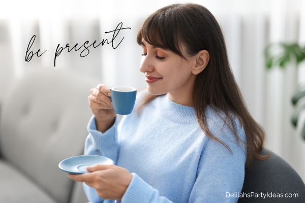 woman happily having coffee at home, with quote overlay