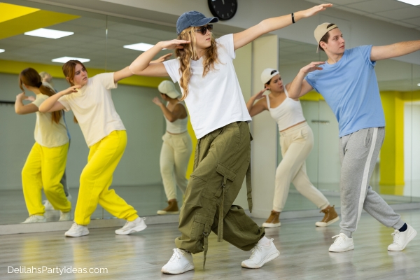 group of teens dancing in a studio