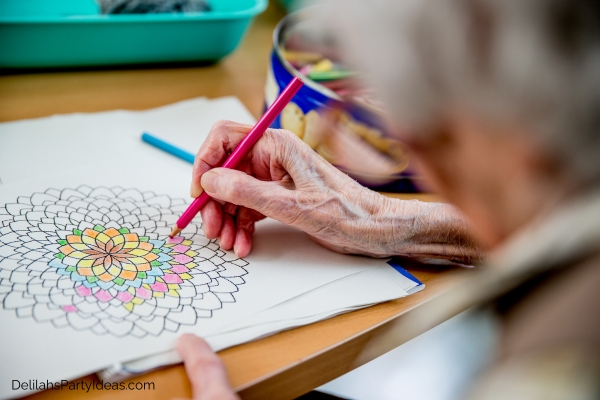 senior woman coloring mandala