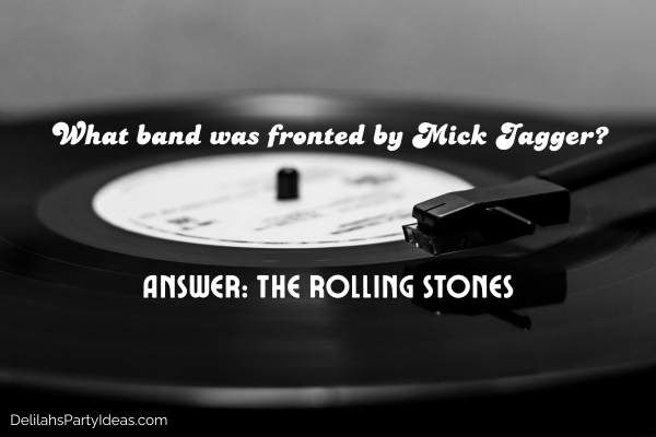 black and white vinyl record player with trivia question and answer overlay